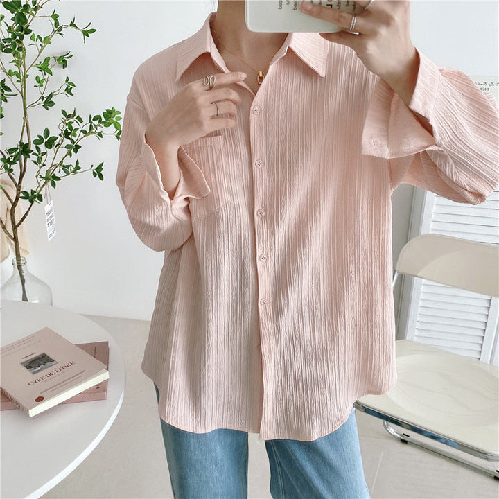 Pink button-up blouse with point collar, long sleeves, chest patch pocket