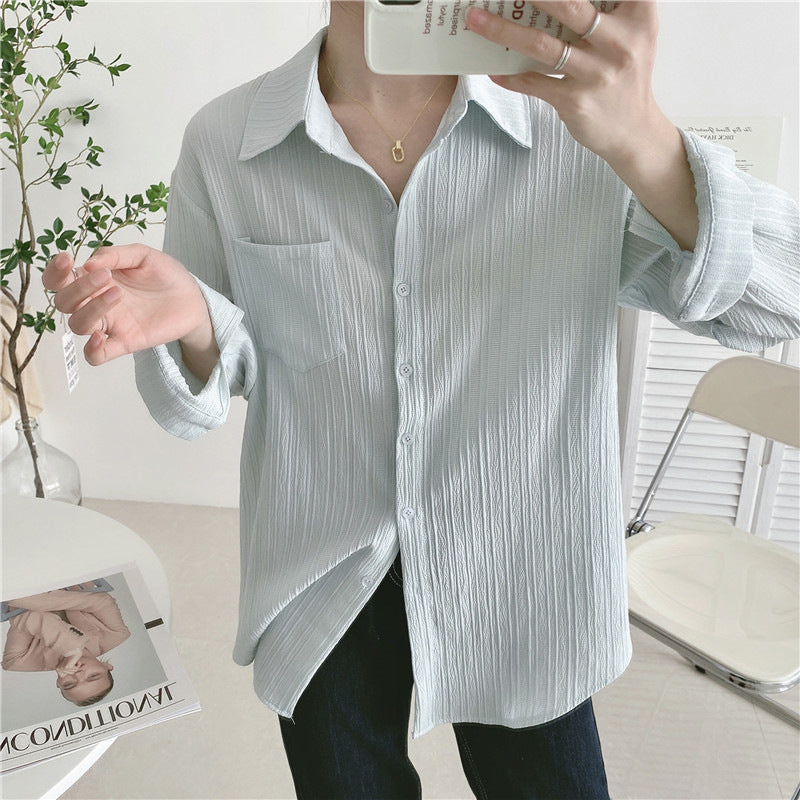 Light mint button-up blouse with point collar, long sleeves, chest patch pocket