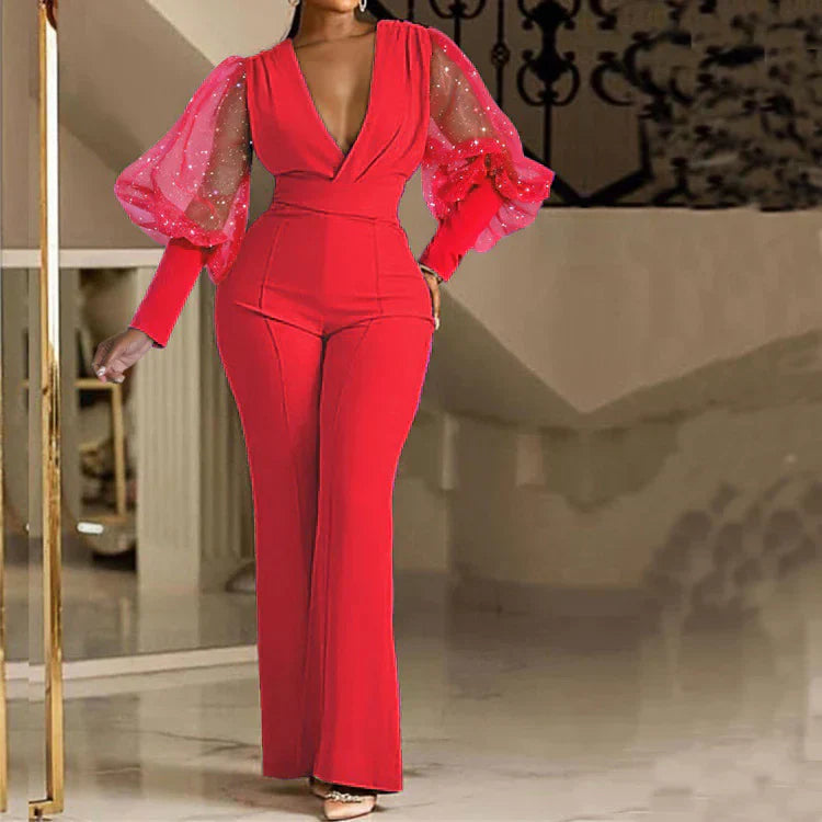 Red embellished wrap-front jumpsuit with sheer puff sleeves and long flare legs