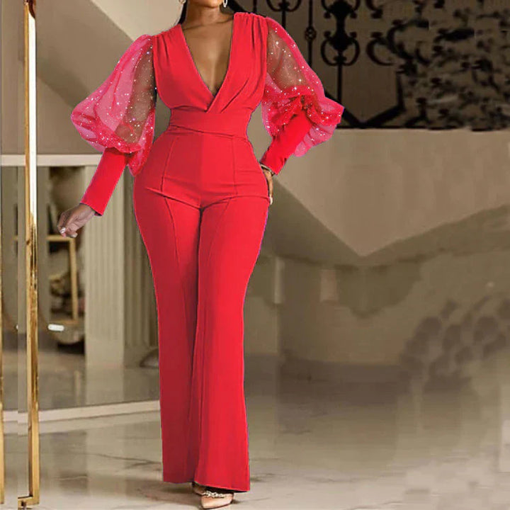 Red embellished wrap-front jumpsuit with sheer puff sleeves and long flare legs