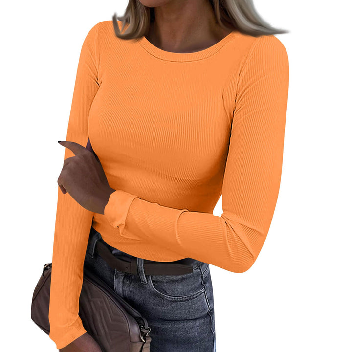 Orange ribbed crewneck top with long fitted sleeves