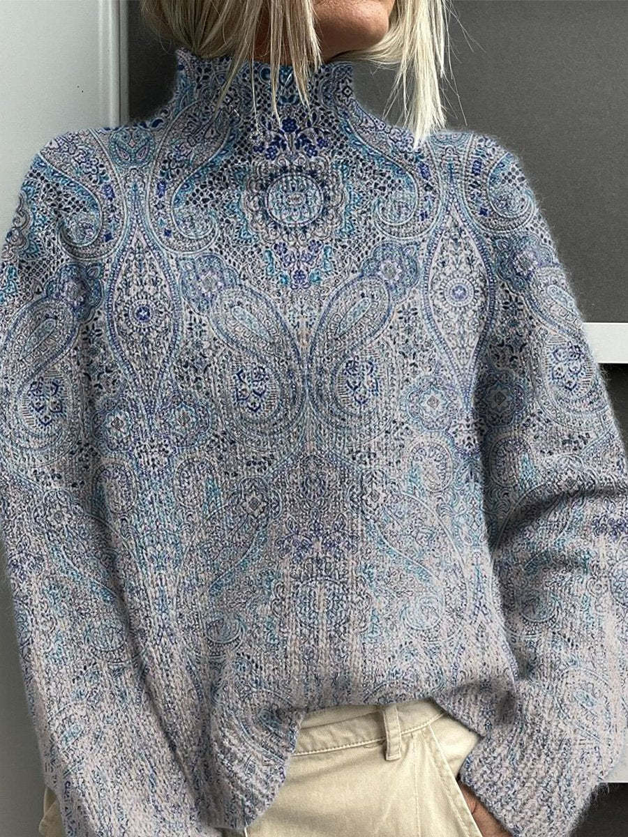 Turtleneck sweater in heather blue with paisley-like pattern and ribbed collar