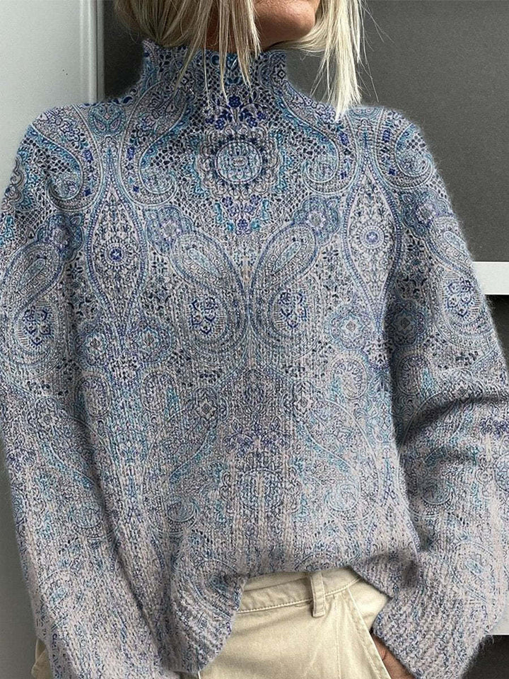 Turtleneck sweater in heather blue with paisley-like pattern and ribbed collar