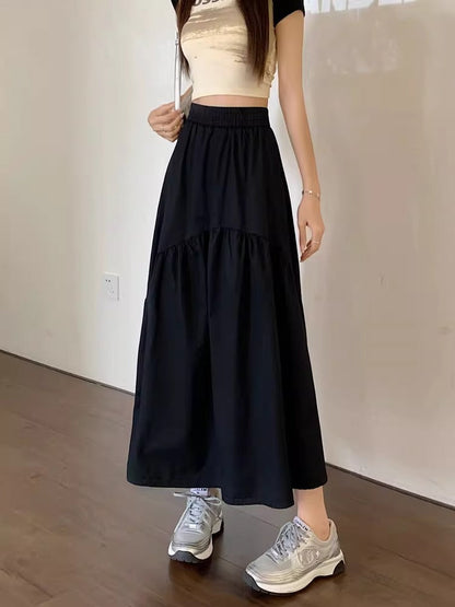 Black maxi skirt with elastic waist and tiered ruffle hem
