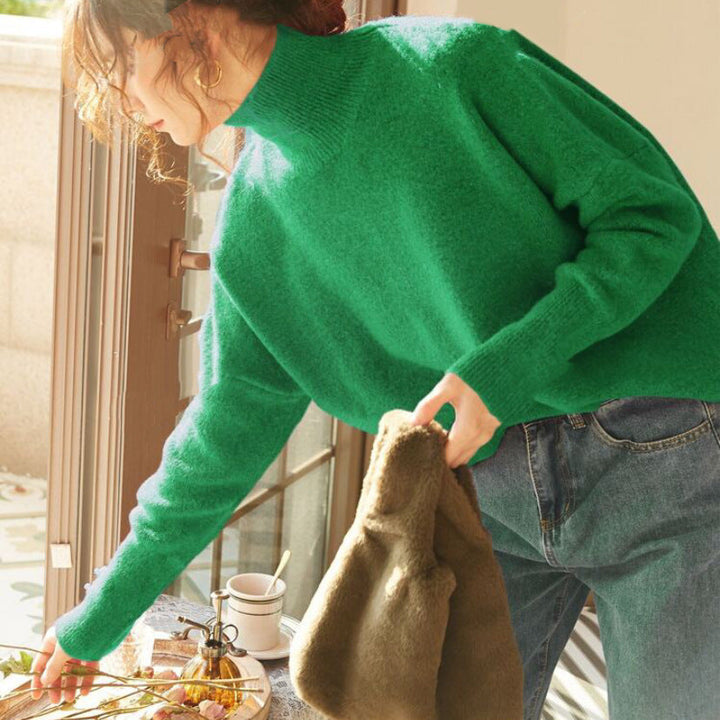 Green turtle-neck long-sleeve sweater with ribbed collar and sleeve cuffs