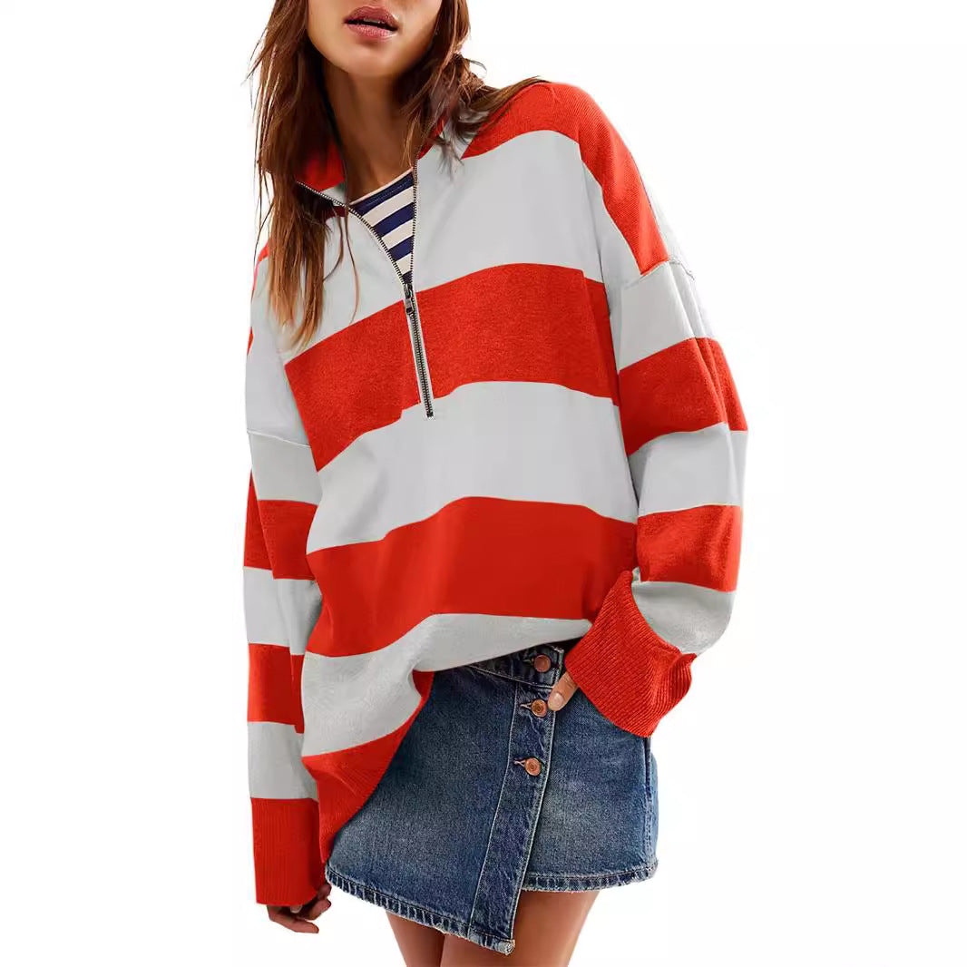 Long-sleeve pullover sweater with half-zip, white and red bold stripe pattern.