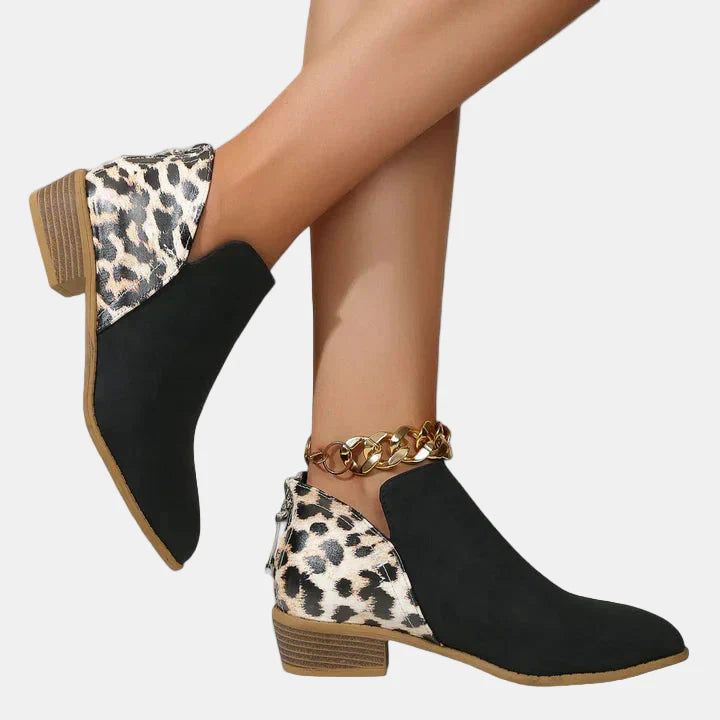 Black and leopard-print ankle boots with gold chain ankle strap and block heel