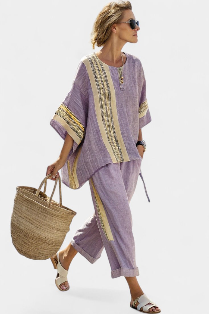 Lavender tunic top with striped trim and cuffed cropped trousers