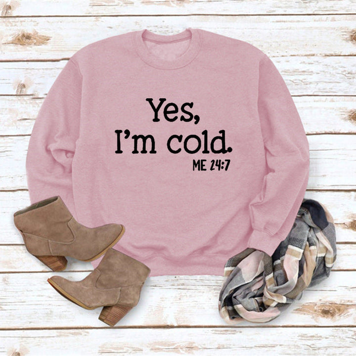 Pink pullover sweatshirt with 'Yes, I'm cold.' ME 24:7 slogan print