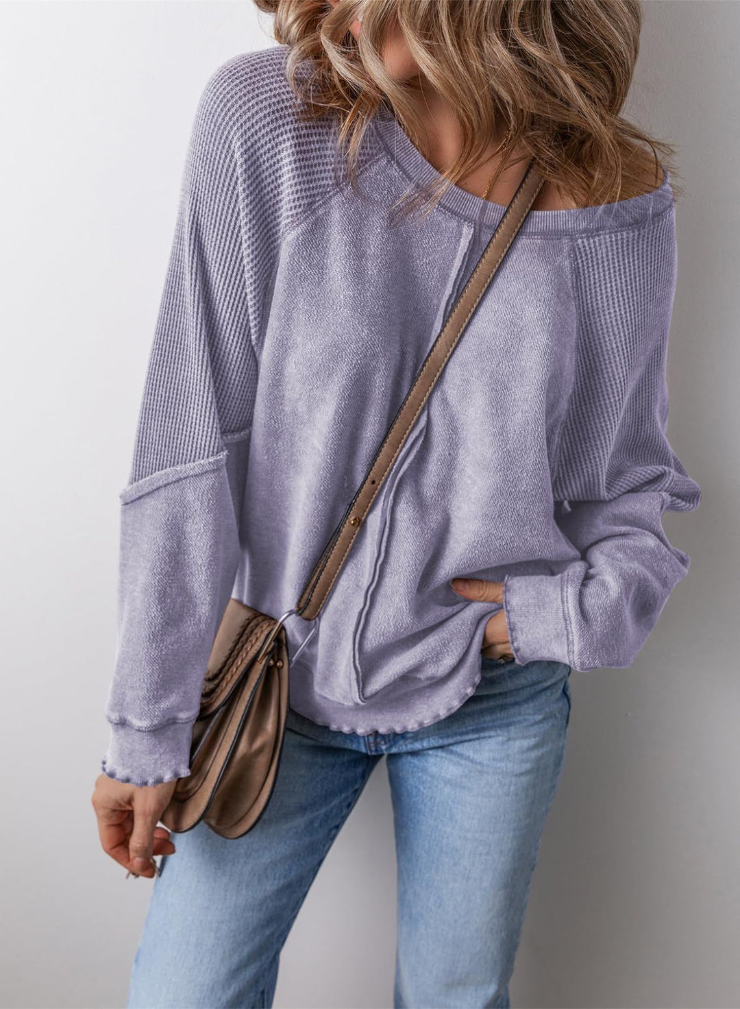 Purple crew neck long-sleeve sweatshirt with ribbed cuffs and hem
