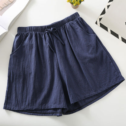 Navy relaxed-fit shorts with elastic waistband and drawstring tie