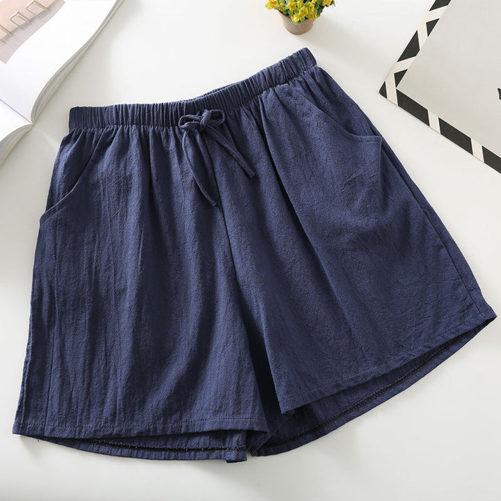 Navy relaxed-fit shorts with elastic waistband and drawstring tie
