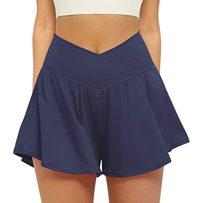 High waist active skort in navy blue, flowy pleated skirt with inner shorts