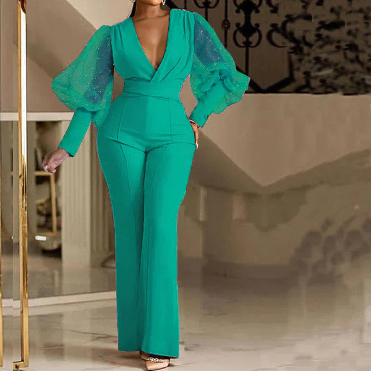 Green embellished wrap-front jumpsuit with sheer puff sleeves and long flare legs