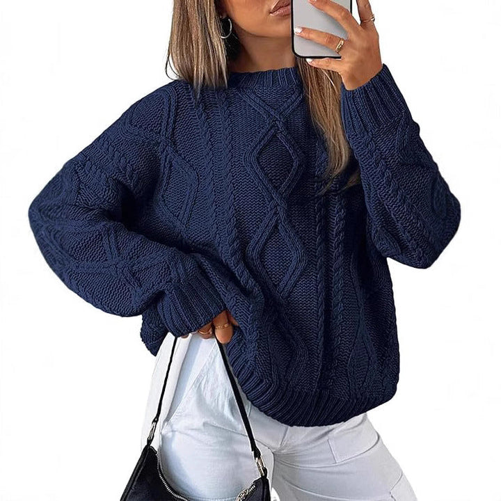 Navy oversized cable-knit sweater with long sleeves and crew neck