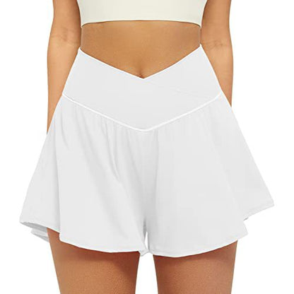 High waist active skort in white, flowy pleated skirt with inner shorts