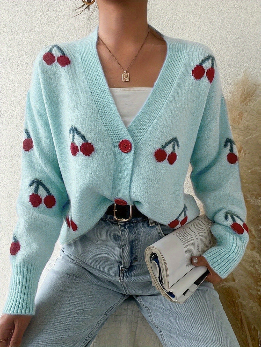 Mint green button-front long-sleeve cardigan with red cherry print and V-neck