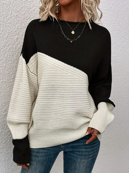 Two-tone knit sweater with round neck, long sleeves, black and cream color block