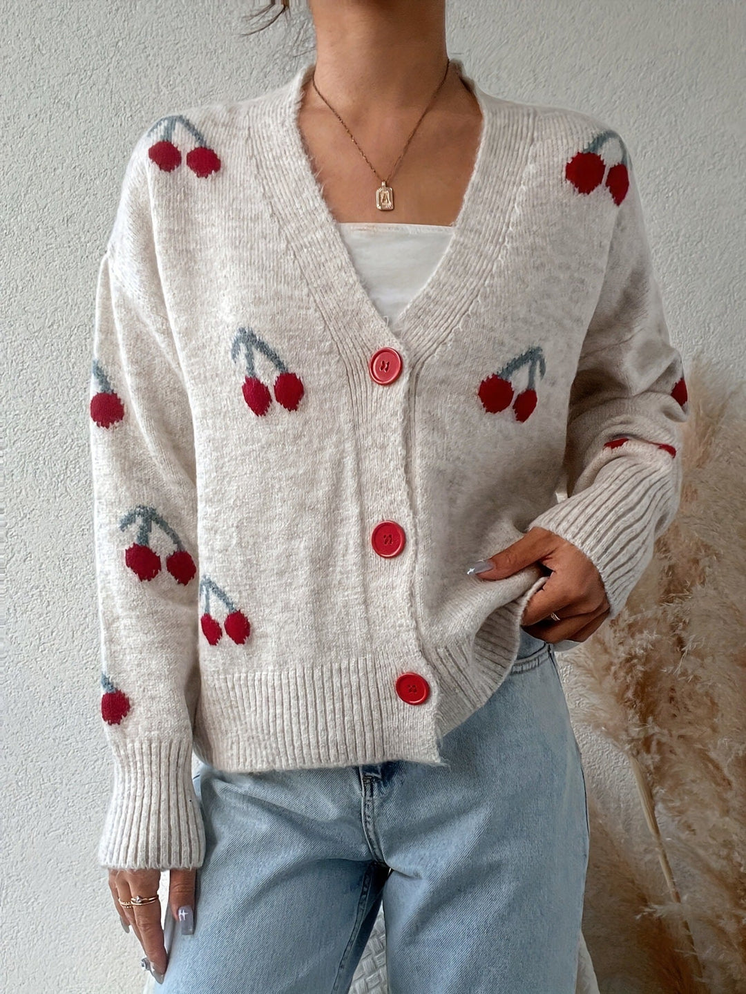 Light gray button-front long-sleeve cardigan with red cherry print and V-neck
