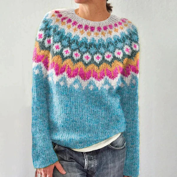 Light blue crewneck sweater with colorful Fair Isle yoke and long sleeves