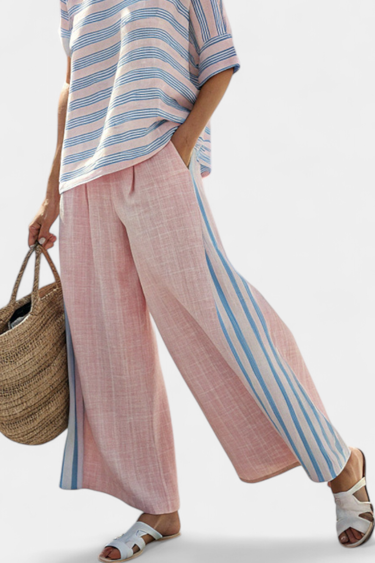 Light pink wide-leg trousers with blue side stripe panel and wide hem