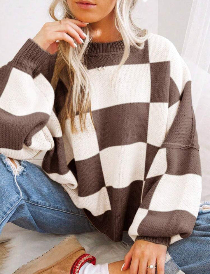 PILDA™ sweater in brown-and-white check, crew neck, loose long sleeves.