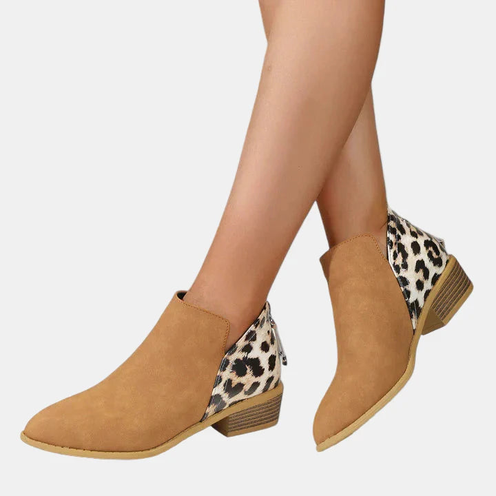 Tan ankle boots with leopard-print side panels, gold chain detail, and block heel