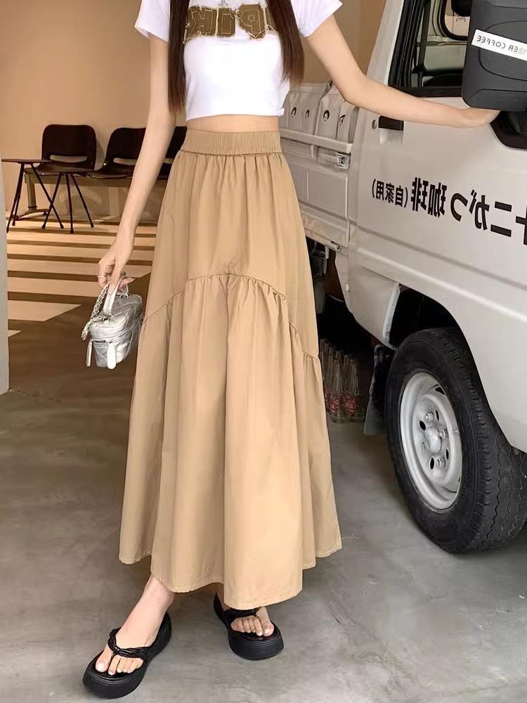 Beige long tiered skirt with elastic waistband, soft gathered layers