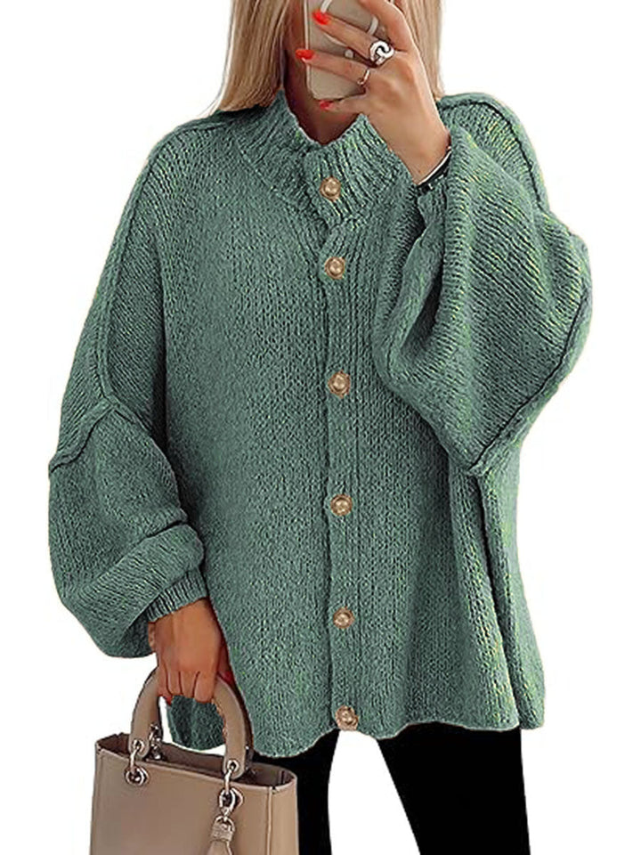 Cozy button-down long sleeve chunky knit jacket in teal green with gold buttons