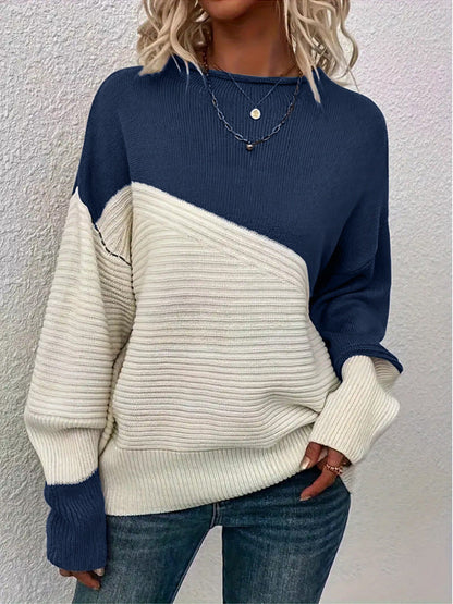 Two-tone knit sweater with round neck, long sleeves, navy and cream color block