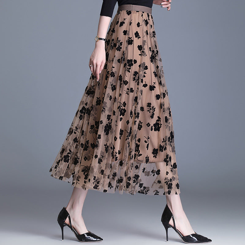 Beige floral midi skirt with black flower print, elastic waistband, tiered tulle look