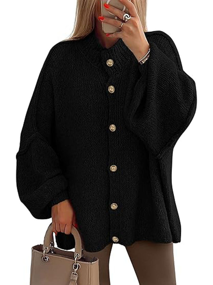 Cozy button-down long sleeve chunky knit jacket in black with gold buttons