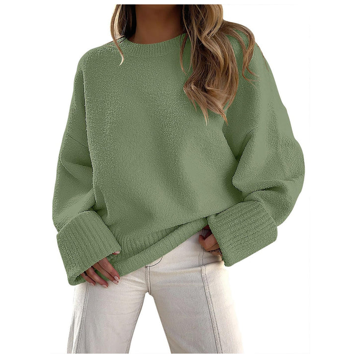 Green fuzzy knit pullover sweater with crew neck and ribbed cuffs, oversized fit