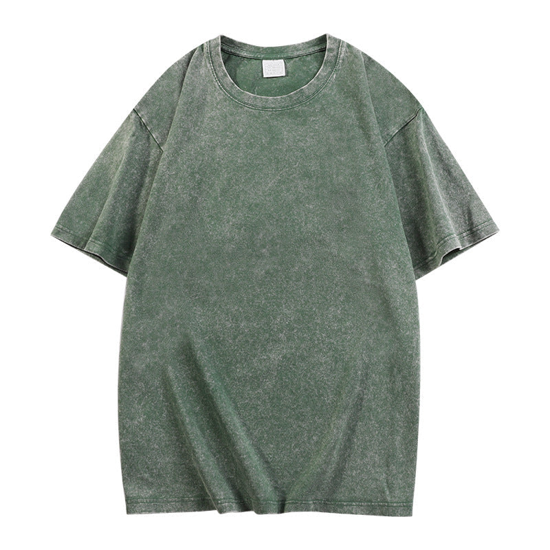 Deep emerald loose-fit crewneck top with short sleeves and ribbed neckline
