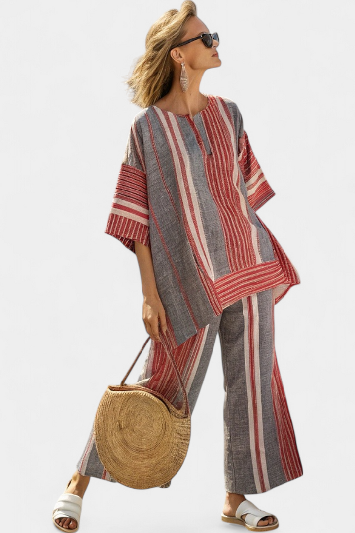 Grey wide-leg trousers with vertical red and white stripes, ankle length