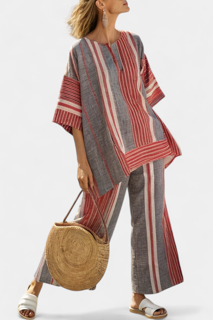 Grey wide-leg trousers with red and white vertical stripe panels, ankle length