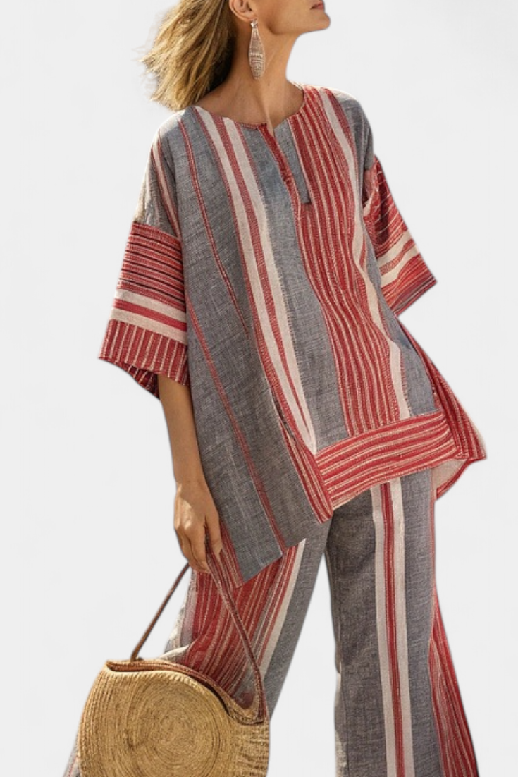 Grey wide-leg trousers with vertical red and white stripes and flared legs