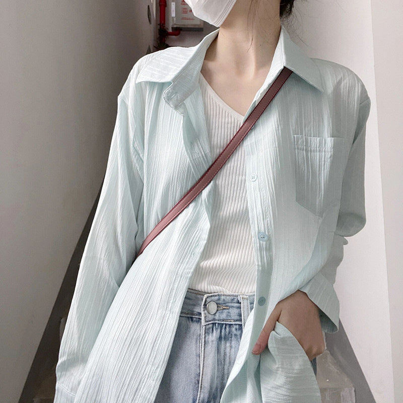 Light mint button-up blouse with point collar, long sleeves, chest patch pocket