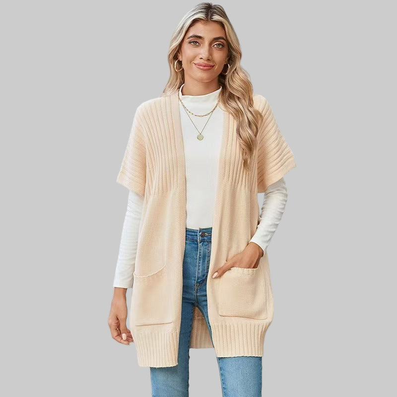 Cream open-front knit cardigan with ribbed sleeves and patch pockets