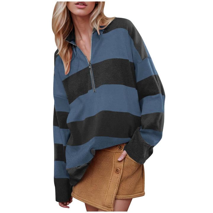 Long-sleeve pullover sweater with half-zip, navy blue and charcoal stripe pattern.