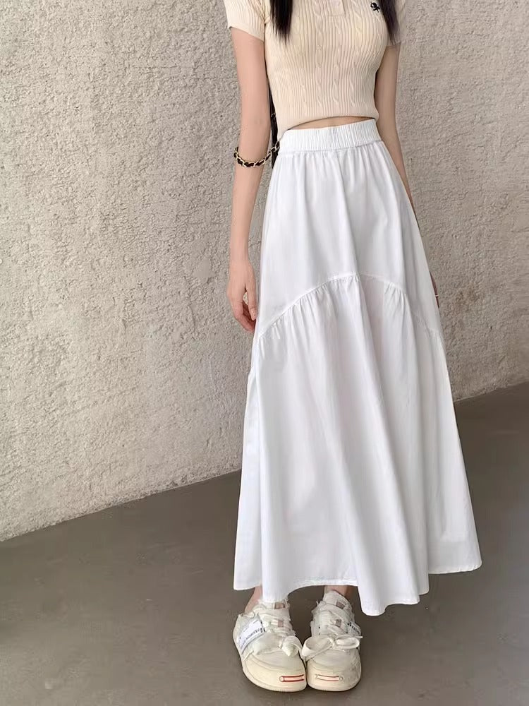 White long skirt with elastic waistband and tiered, gathered hem panels