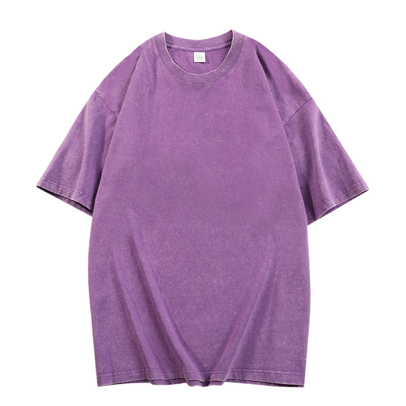 Purple loose-fit crewneck top with short sleeves and ribbed neckline