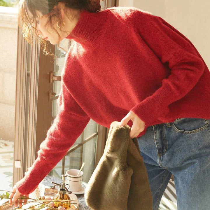 Red turtle-neck long-sleeve sweater with ribbed collar and sleeve cuffs