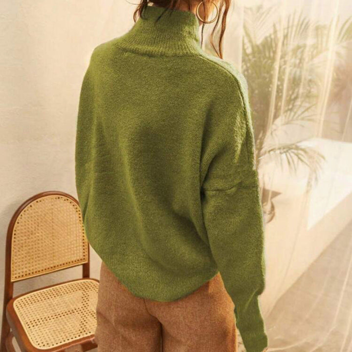 Olive green turtle-neck long-sleeve sweater with ribbed collar and cuffs