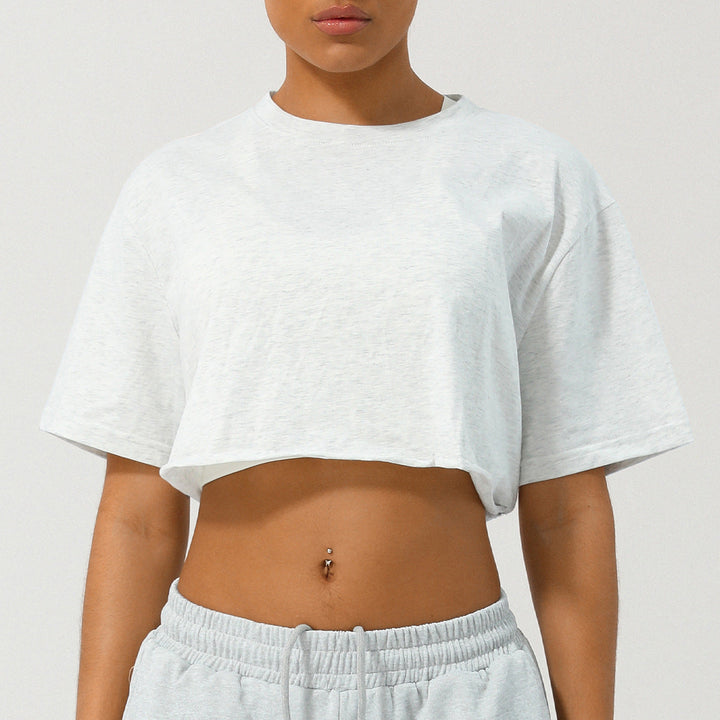 White relaxed-fit crop tee with crew neck and short sleeves