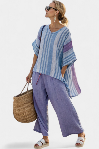 Striped blue top with relaxed fit and lavender wide-leg linen trousers