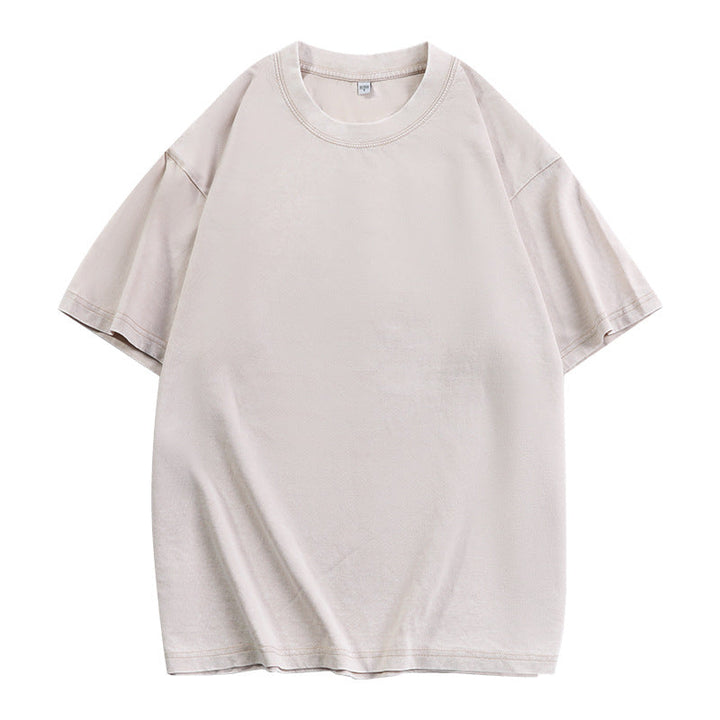 Apricot loose-fit crewneck top with short sleeves and ribbed neckline