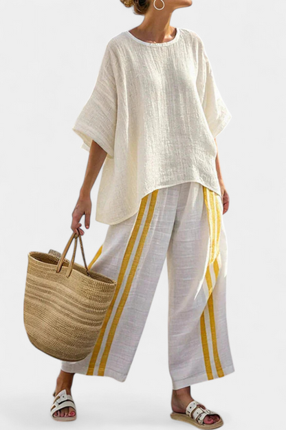 Linen top and wide-leg trousers set, off-white top with yellow-striped white pants.