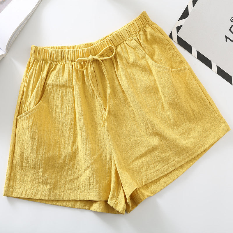 Goose yellow relaxed-fit shorts with elastic waistband and drawstring tie