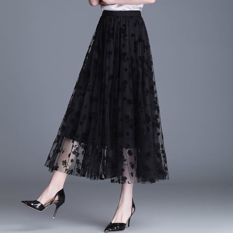 Black floral midi skirt with sheer mesh overlay, gathered elastic waistband, tiered hem